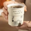 bdc0389e-9ce0-4792-8fc9-9f2290400371 Cartoon Ceramic Handheld Cup with Silicone Lid